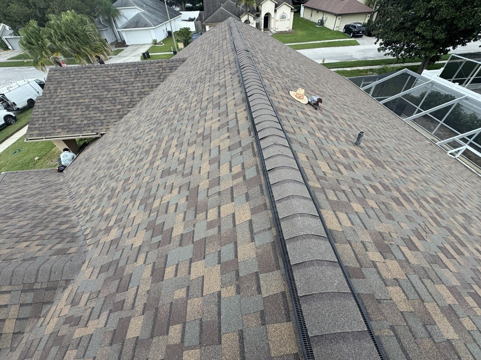 Finished roof with the new ventilated ridge, high angle on a shingle roof in Wesley Chapel