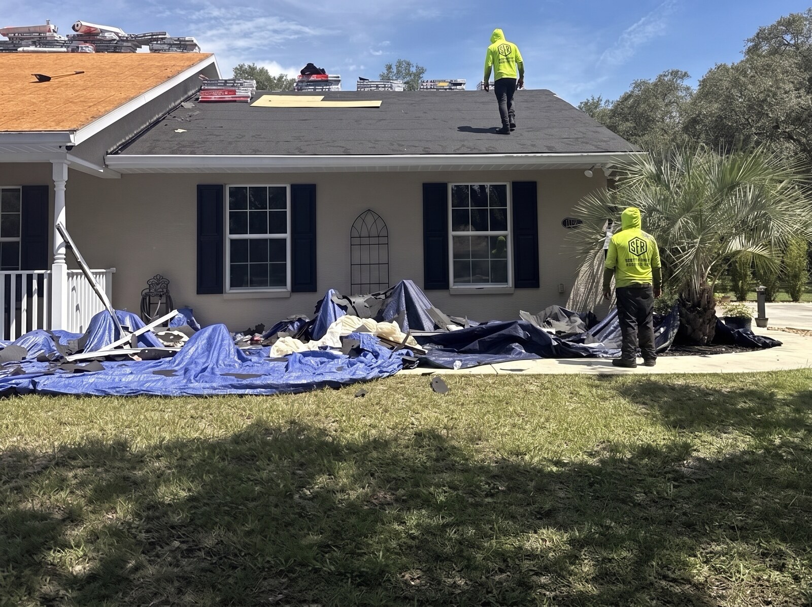 Wide view of a Hernando FL home stripped to the deck during a Scotti Family Roofing tear off