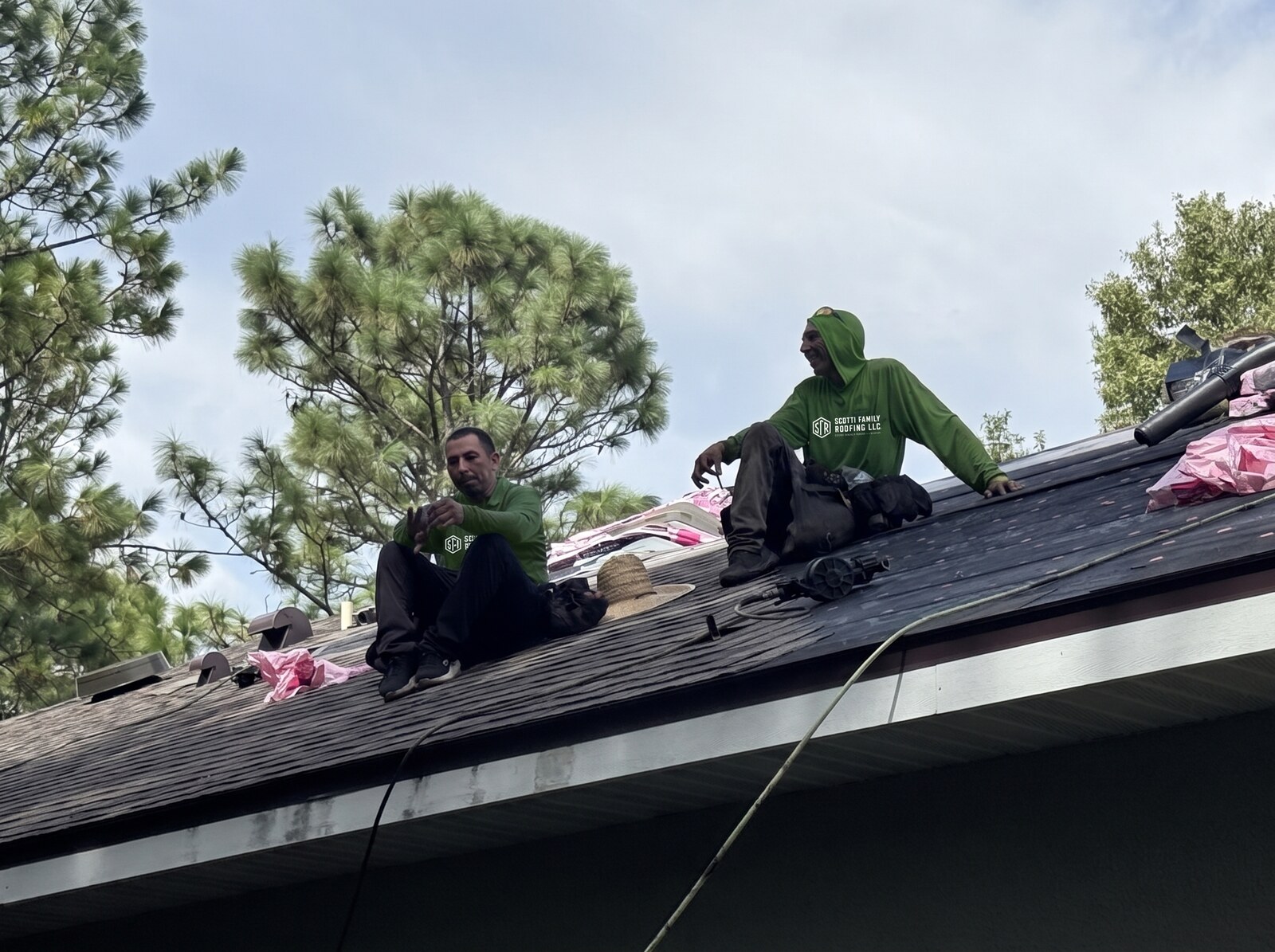 Scotti Family Roofing crew working the eave on a Homosassa FL shingle roof replacement