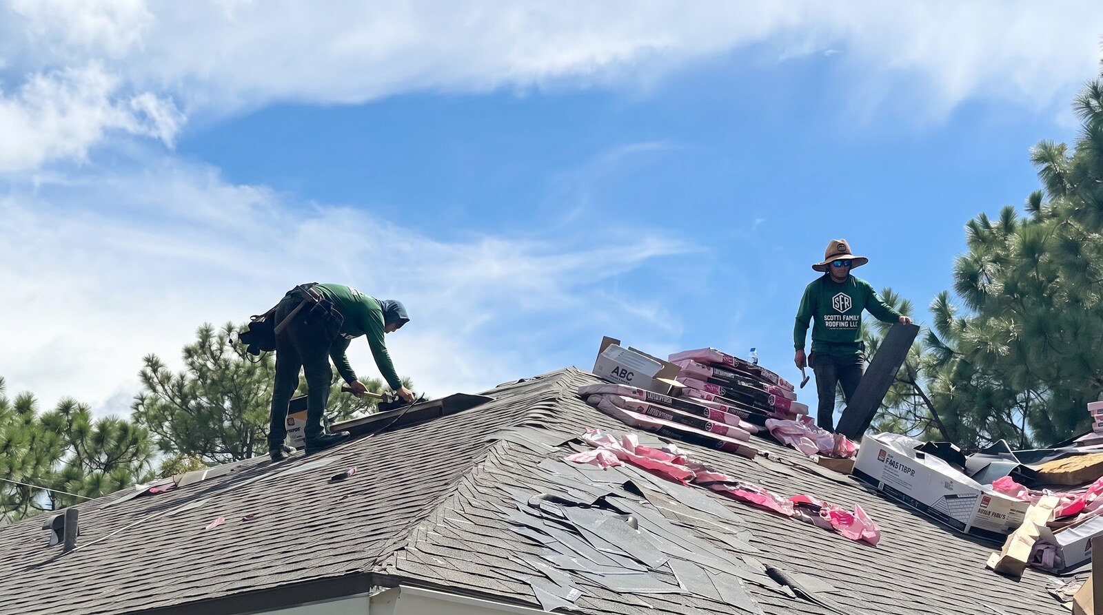 Tear off in progress with Owens Corning TruDefinition Duration bundles stacked on a Homosassa FL roof