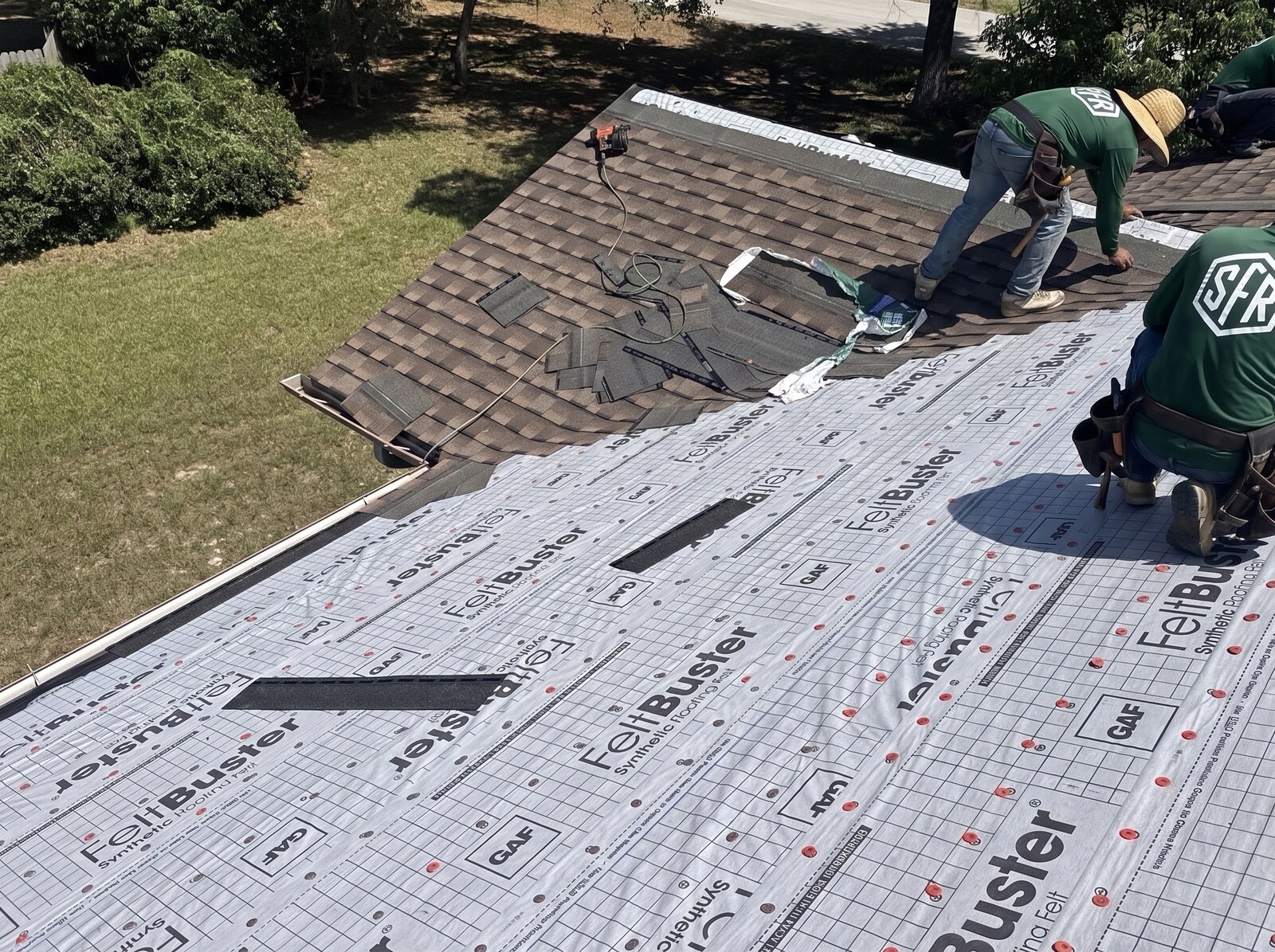 First courses of GAF Timberline shingles going down on a Spring Hill FL roof