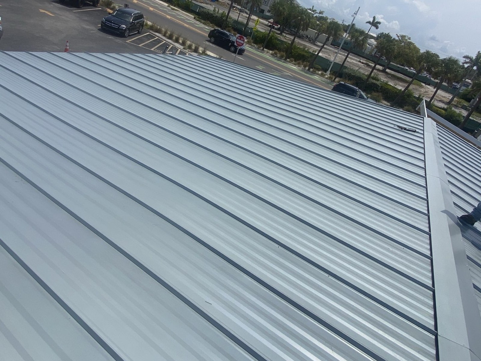 Completed commercial metal roof in Holmes Beach FL - full panel view